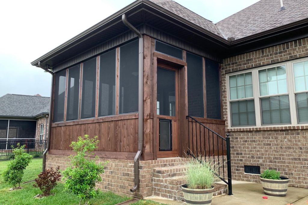 Screened-In Porch (Stained Wood + Custom Rail + Dog Door)